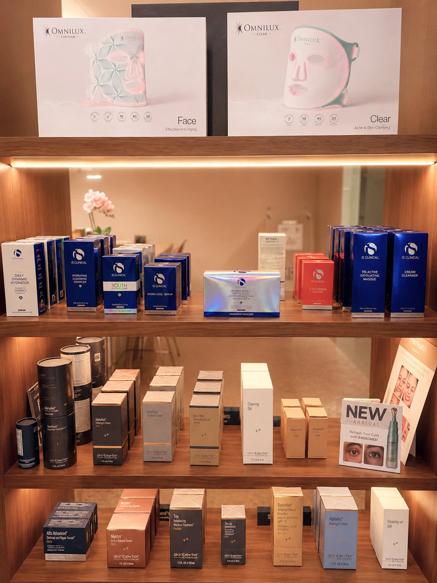 Omnilux LED masks and iS Clinical product display