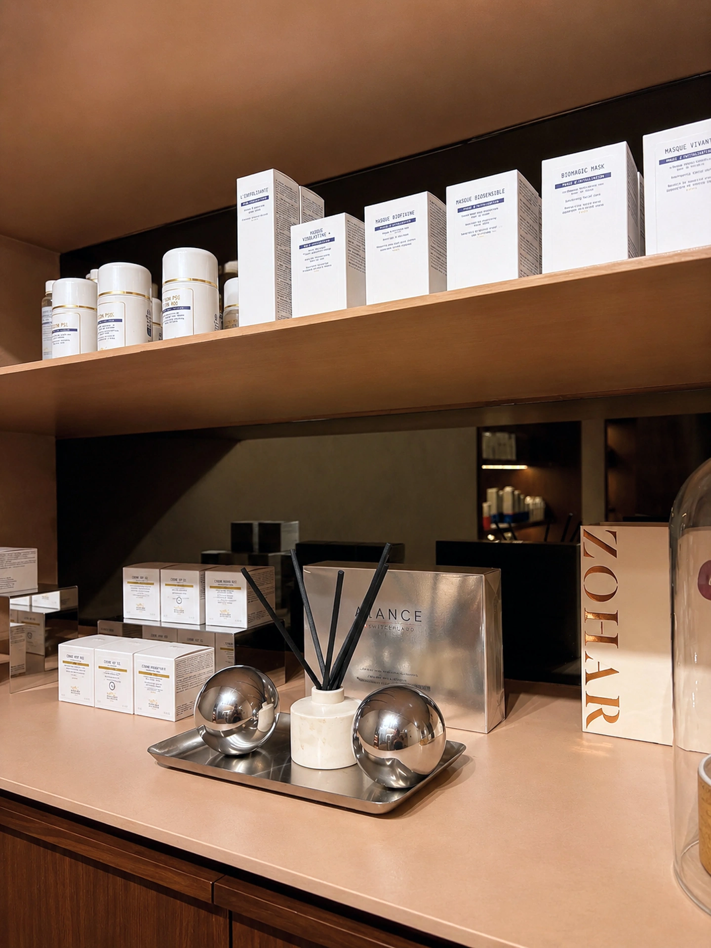 Reed diffuser, ALANCE gift set and Biologique Recherche masks on the Zohar boutique counter